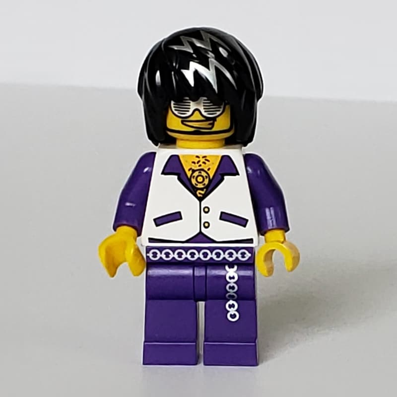 Musician, Man, White Vest over Dark Purple Shirt, Black Hair with Silver Streaks, Glasses